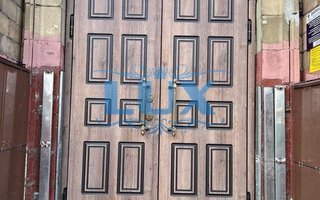 стальная двустворчатая дверь с двумя отбойниками, двумя замками и МДФ отделкой